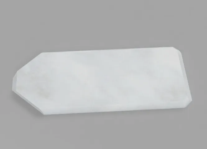Double sided ergonomic bed scraper