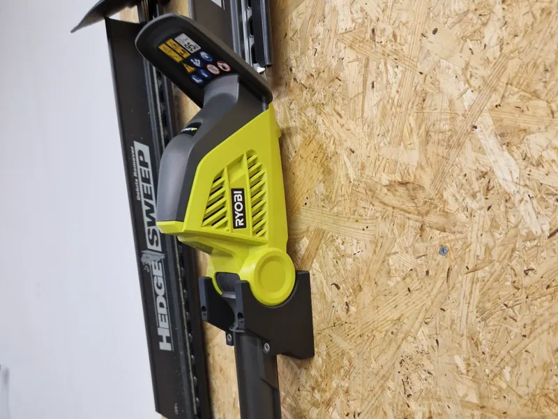 Vägghållare Ryobi Stånghäcksax