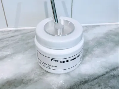 The Spillmaster Container Brush Cover