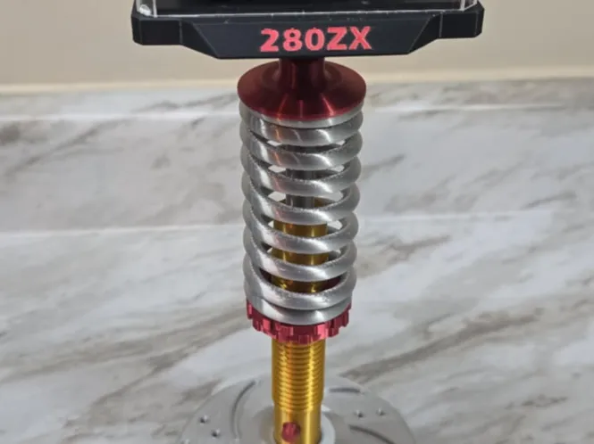 Adjustable height diecast display shock 1:64