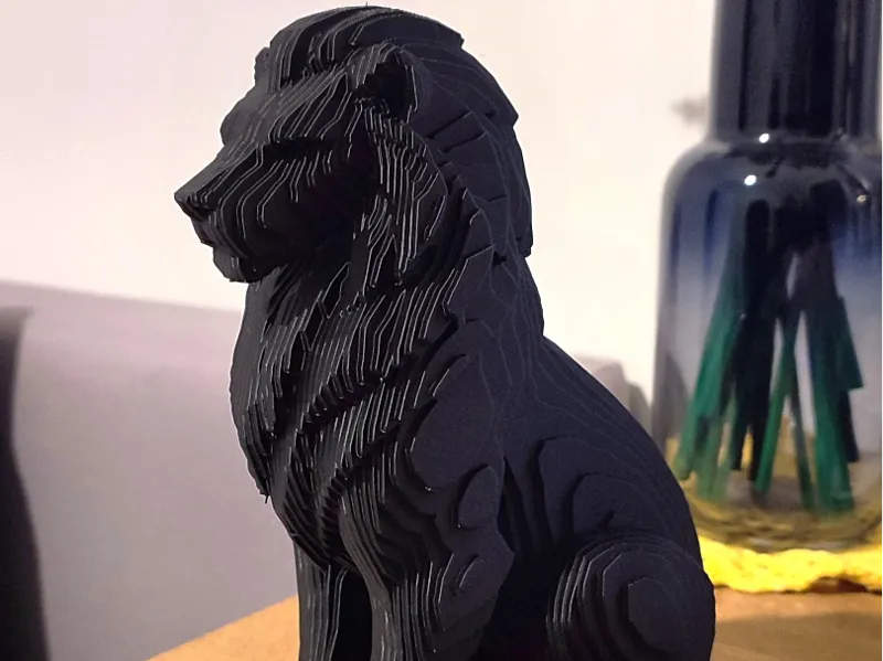 Decorative lion figurine–modern layered sculpture