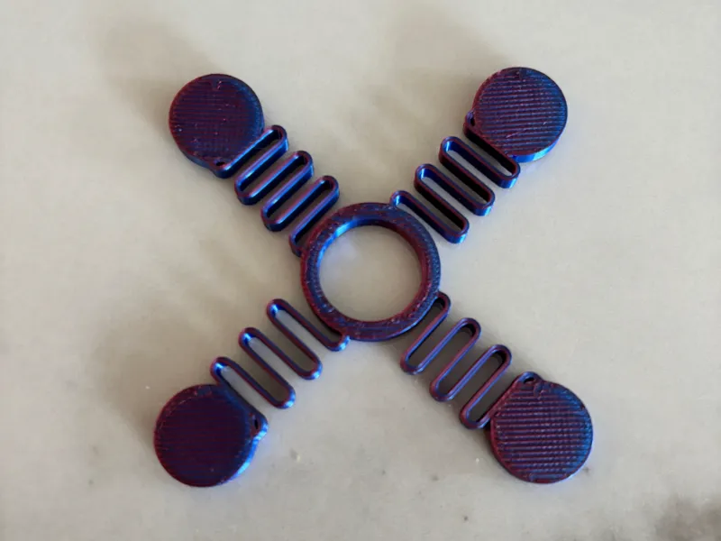 SpinSpring: Dual-Mode Fidget Spinner & Bouncer