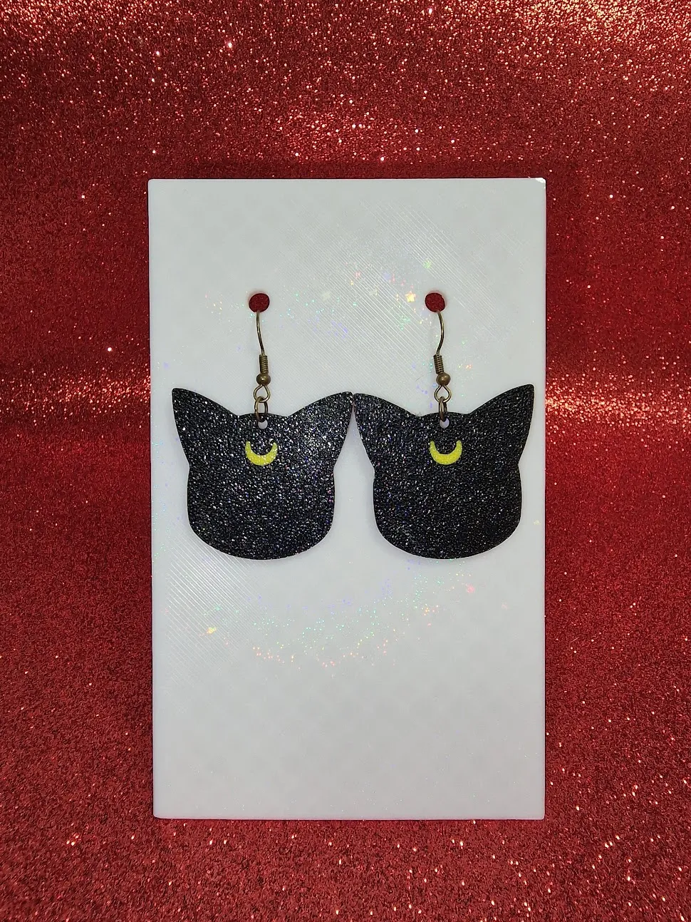 Sailor moon cat earrings view 2