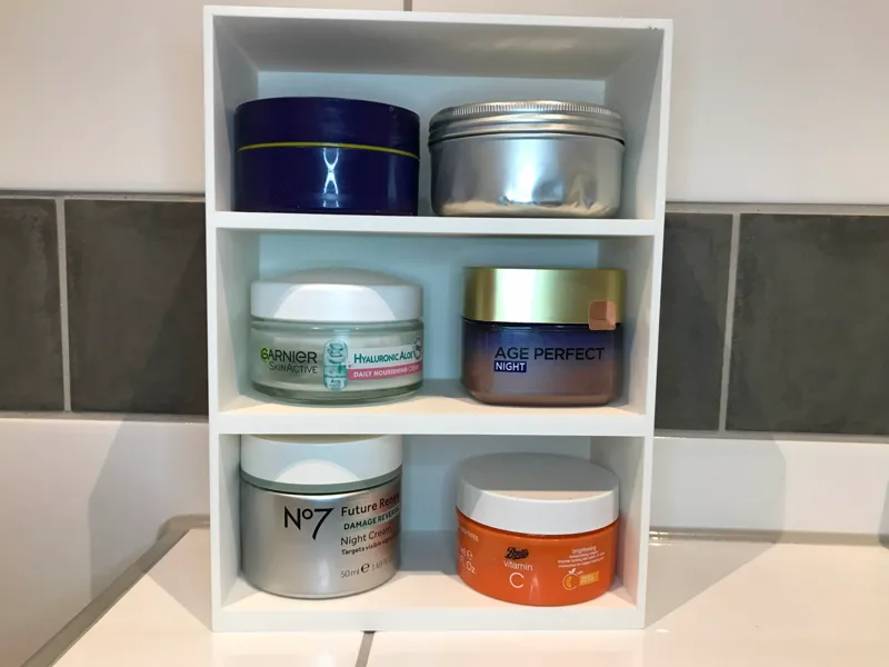 Bathroom shelf for face moisturizer jars