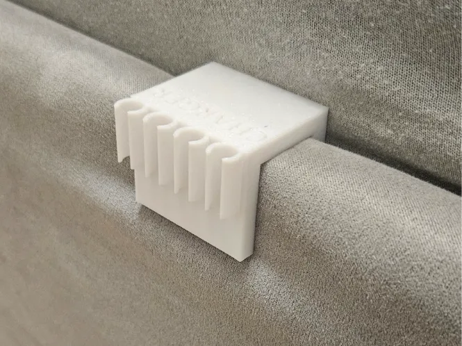 Cable holder from charger to bed