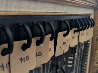 Curved pegboard hook