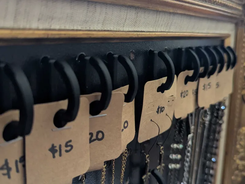 Curved pegboard hook