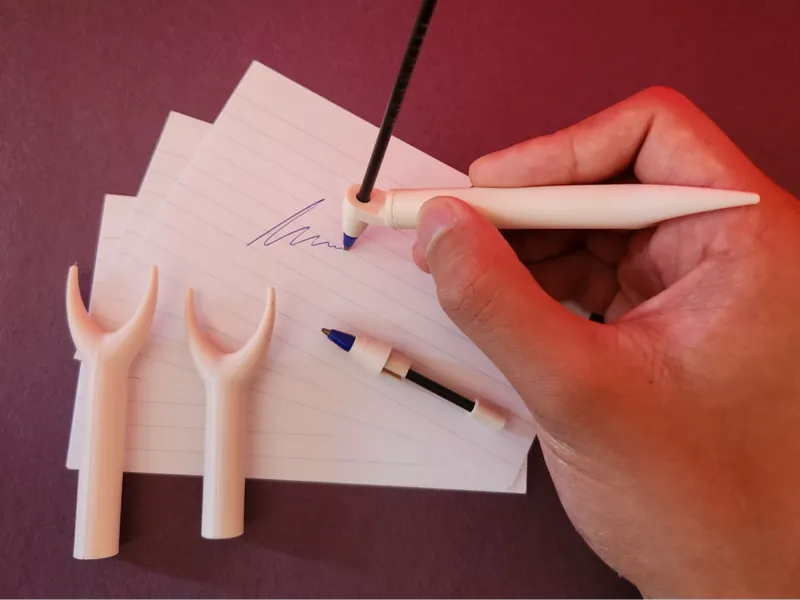 Ergonomic pen with interchangeable tips