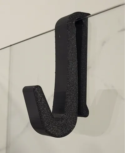 Towel hanger for shower cabin