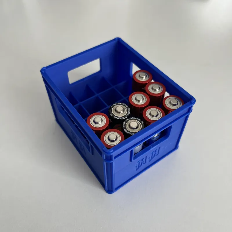Battery (beer) carrier stackable for AA batteries.
