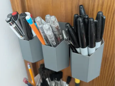 Wall mounted hexagonal pen holder
