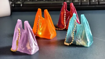 Modelo para impresión 3D: 透明塑料袋/垃圾袋挂件 — vista de referencia 3