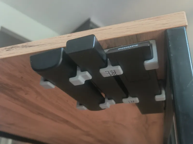Under-desk/under-table remote control holder
