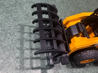 Bruder skid loader grapple