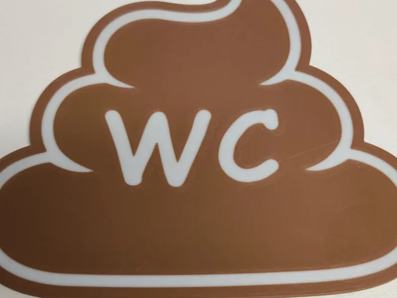 Poop shaped bathroom sign