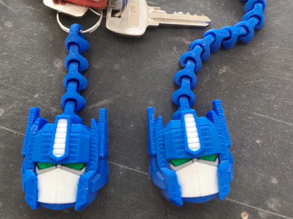 Llavero: Transformers fidget toy and keychain. Referencia del modelo original.