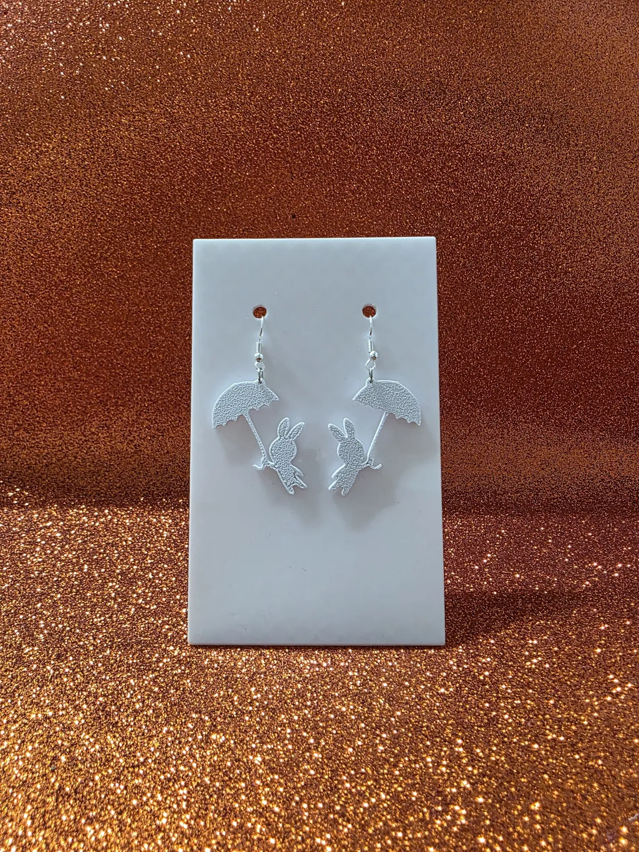 Bunny in flight earrings view 2