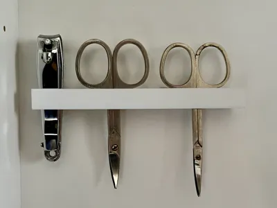 nail clipper and 2 nail scissors for wall/cabinet