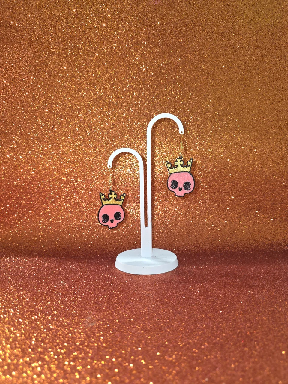 Baby king skull earrings view 3