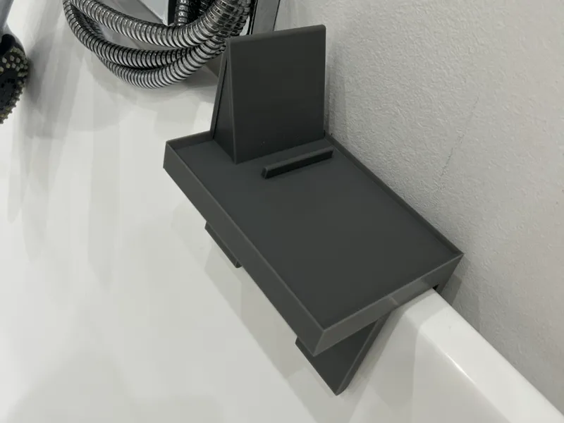 Bath shelf with phone stand