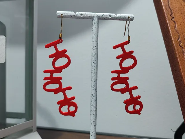 Aretes Mensaje de Claus
