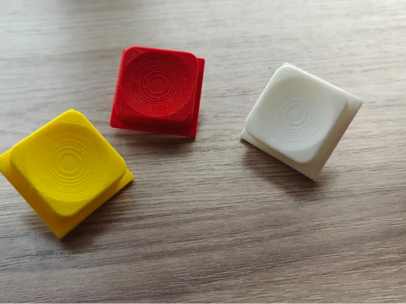 Cap for tact button with square stem. 34x34mm