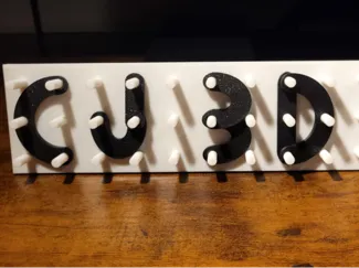 Letter learning peg board, Montessori style.