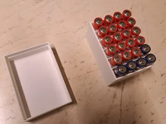 A storage box for AAA batteries