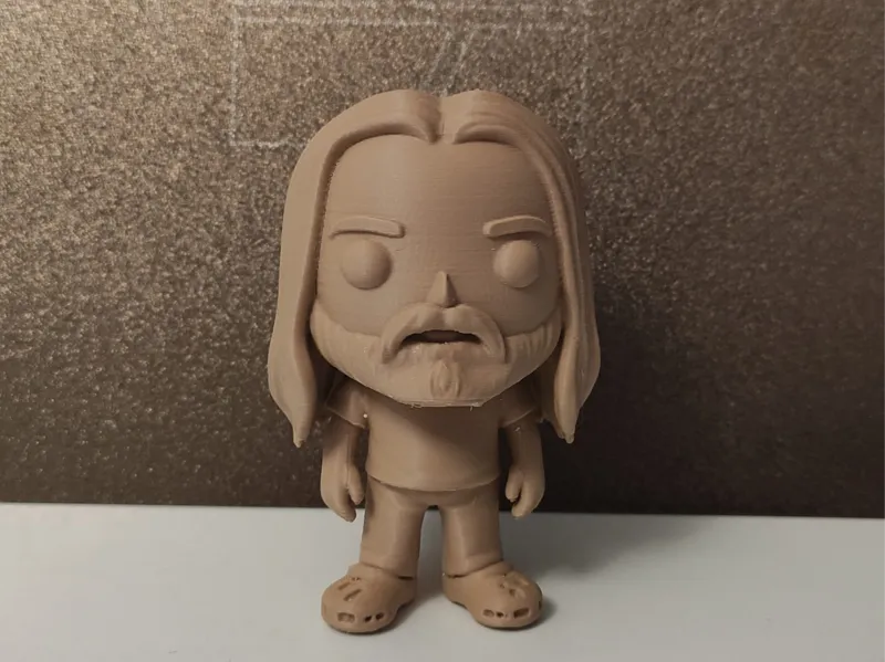Funko hombre pelo largo y barba.