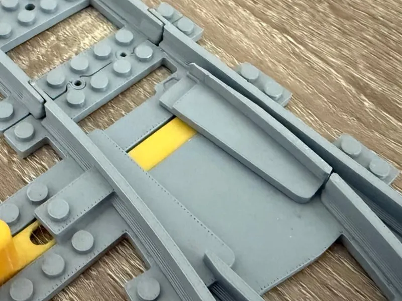 Building brick Train Track switch with spring