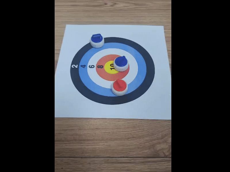 Curling stone with marbles