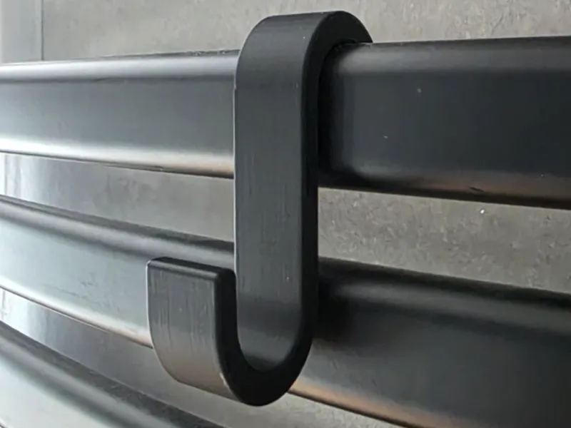 Radiator towel hook
