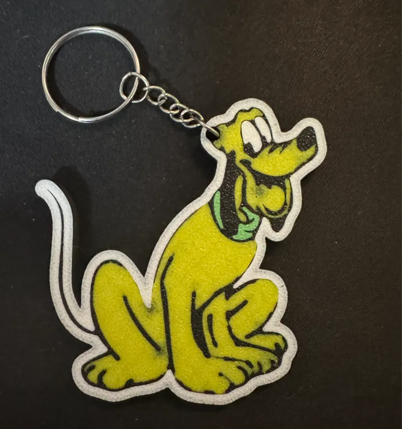 pluto llavero