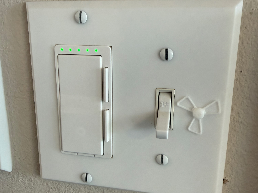 Rocker and toggle switch with fan emblem