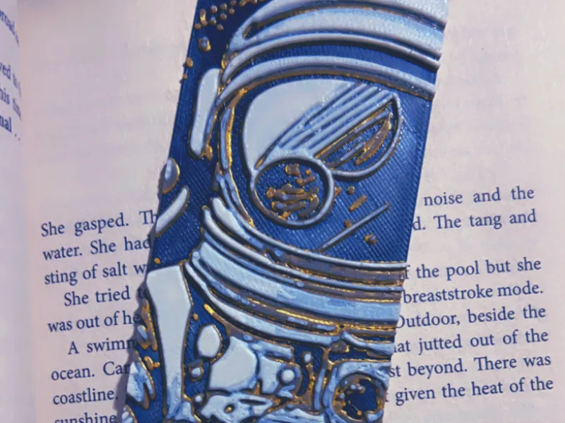 Golden Astronaut Camera Bookmark