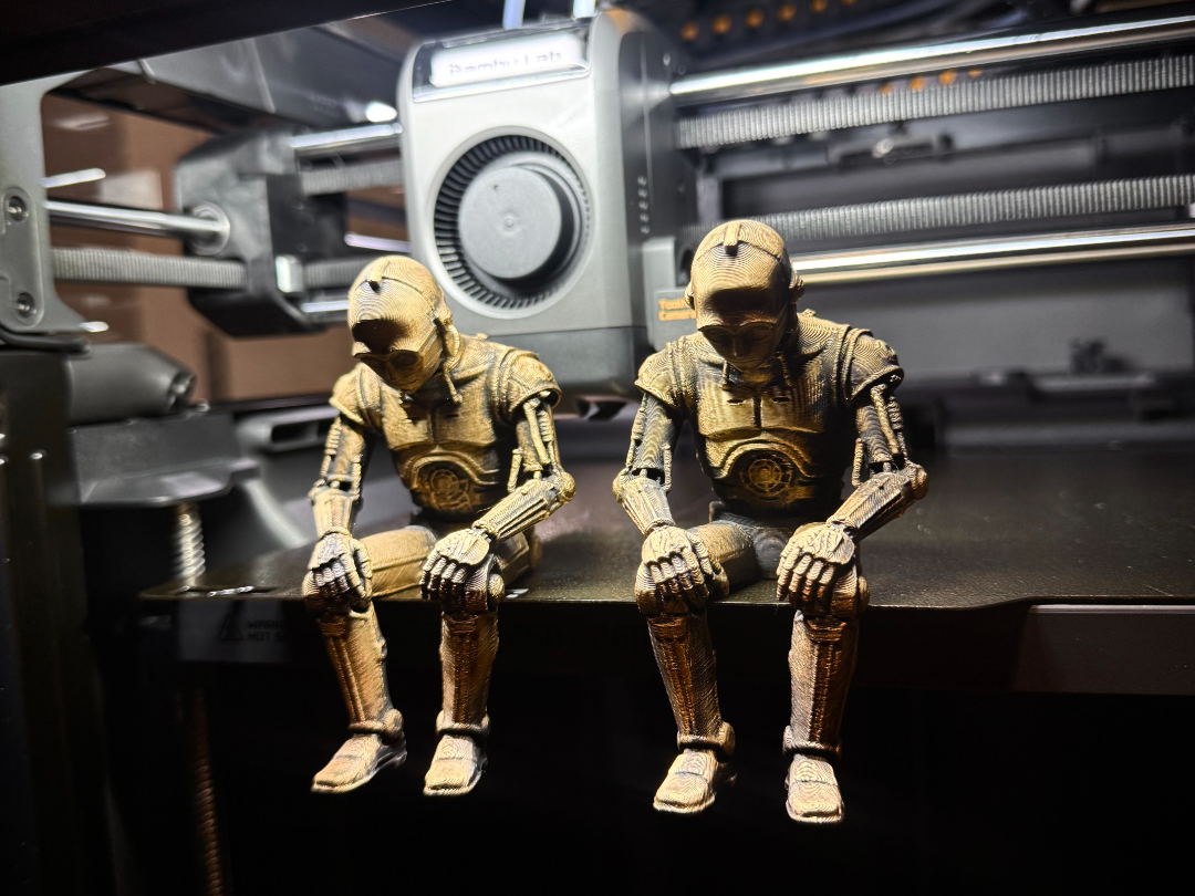 Sad C-3PO Star Wars Figurine sitting on a ledge!