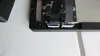 Enlarged recess in the housing for the display connections
