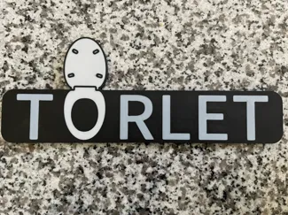 "Torlet" Bathroom Sign