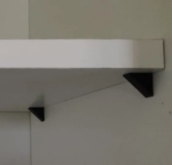 Shelf L support hook for kitchen cupboards.