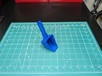 Sample: 70 ml scoop w/ taper & handle angle