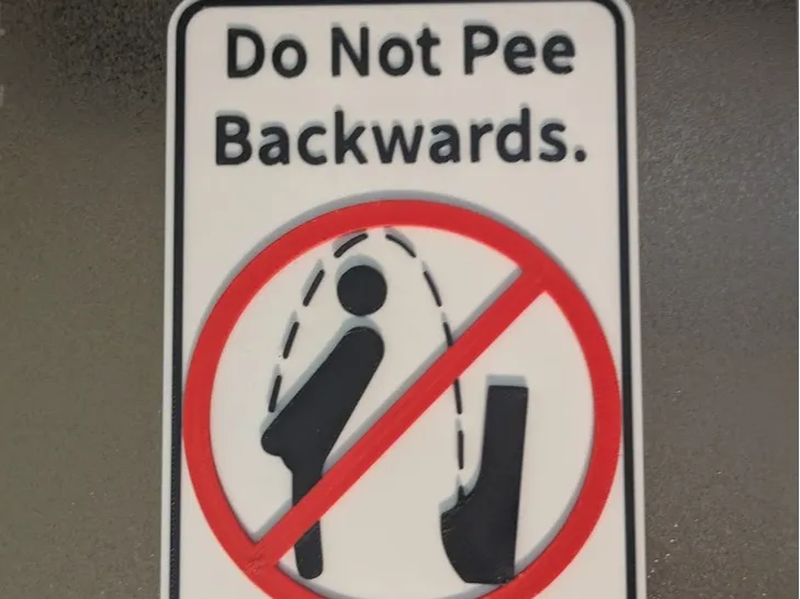Do Not Pee Backwards Sign