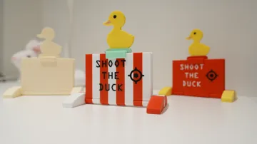 Letrero o emblema decorativo: Shoot the Duck! – Carnival Nerf Target Game — vista de referencia 3