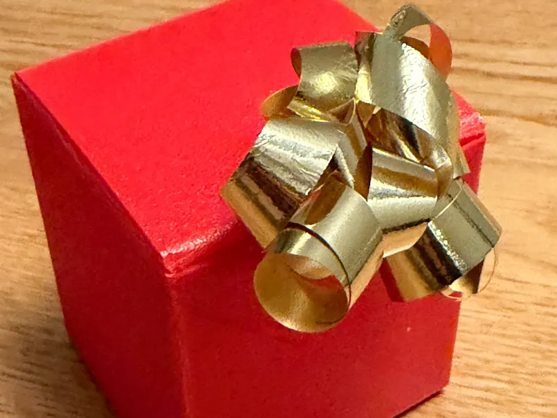 Foldable Gift Box with Ribbon Holes