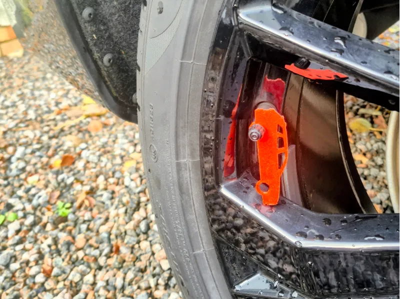 Tyre marking tag shaped like a Volvo XC60