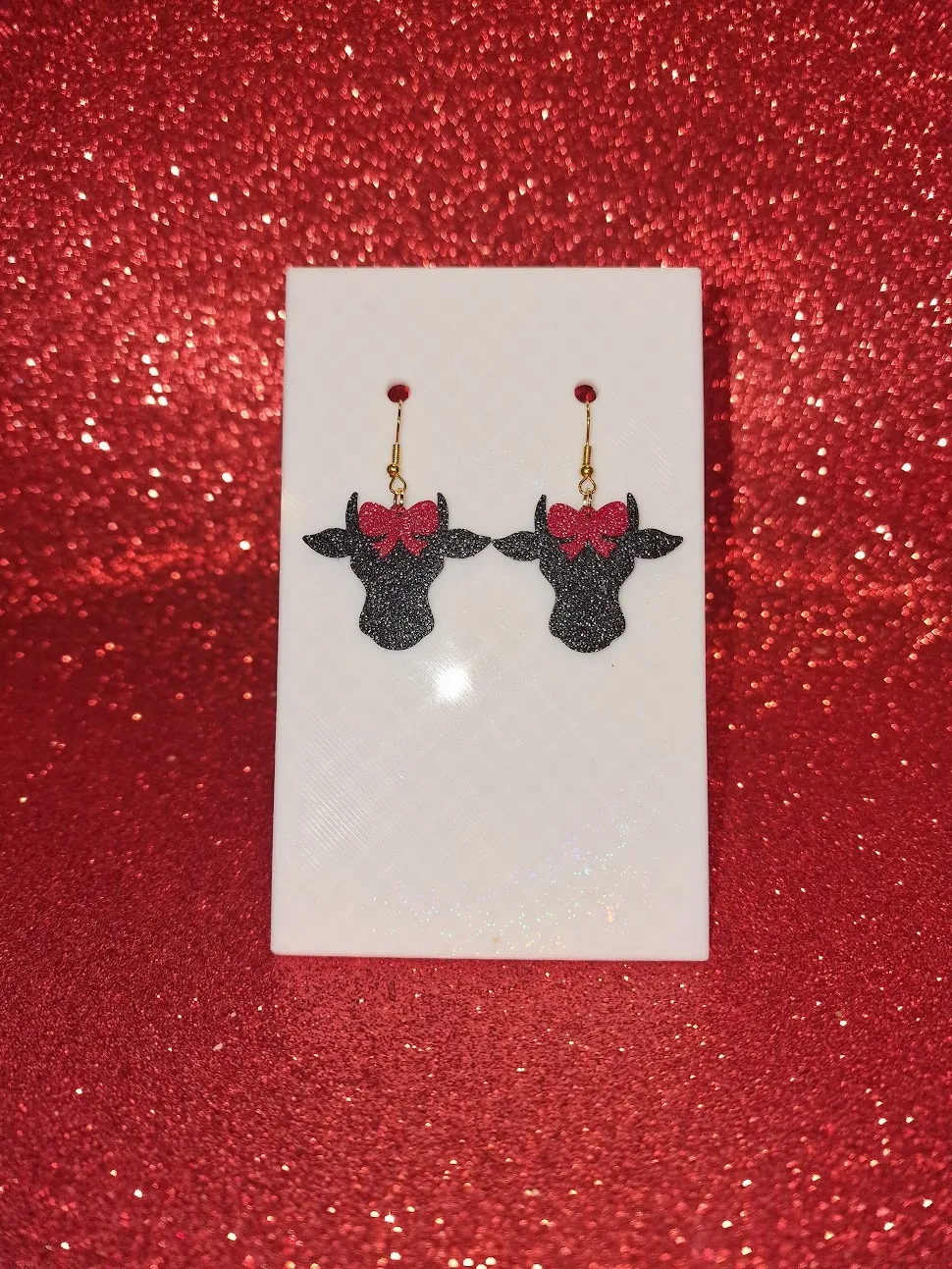 Cow red bow earrings view 2