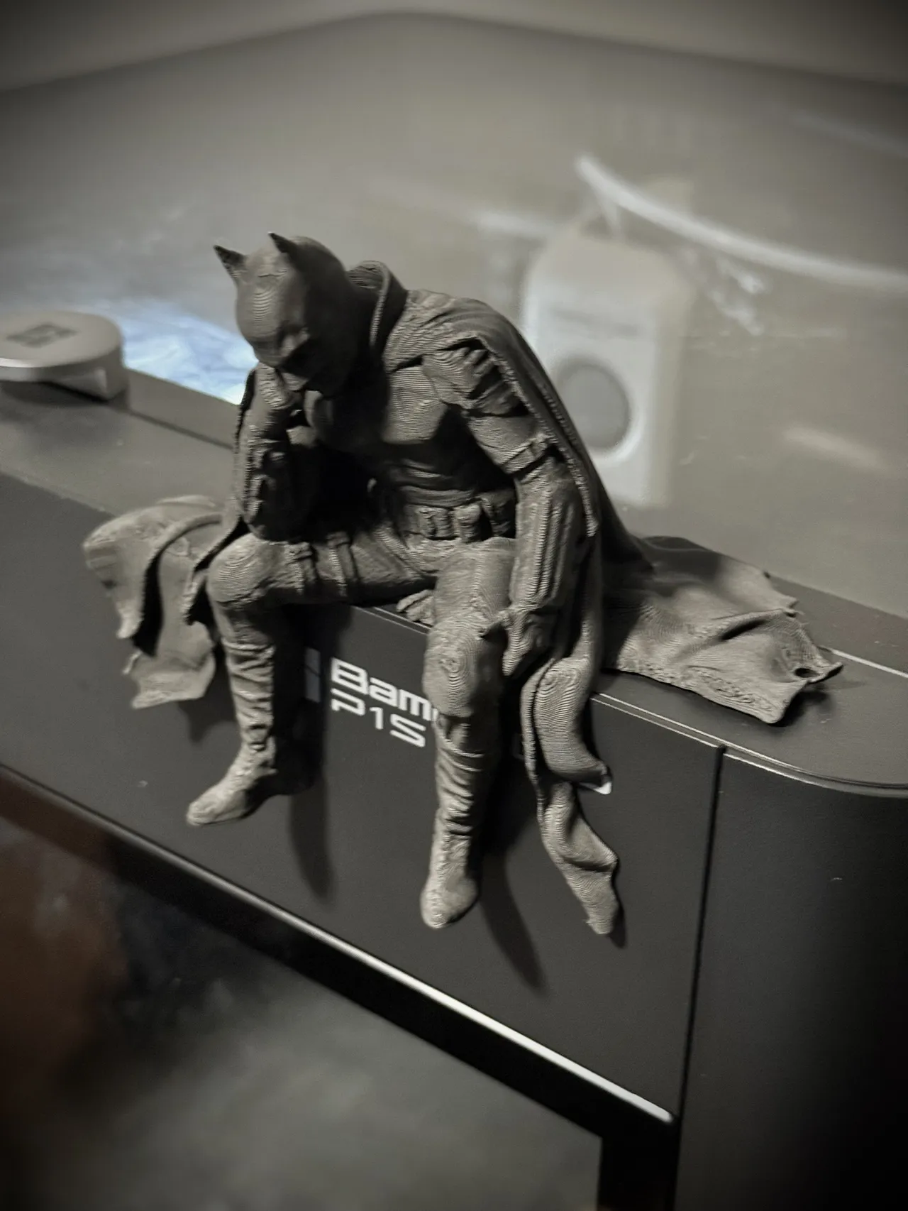 Sad Batman sitting on a Ledge Figurine! view 4