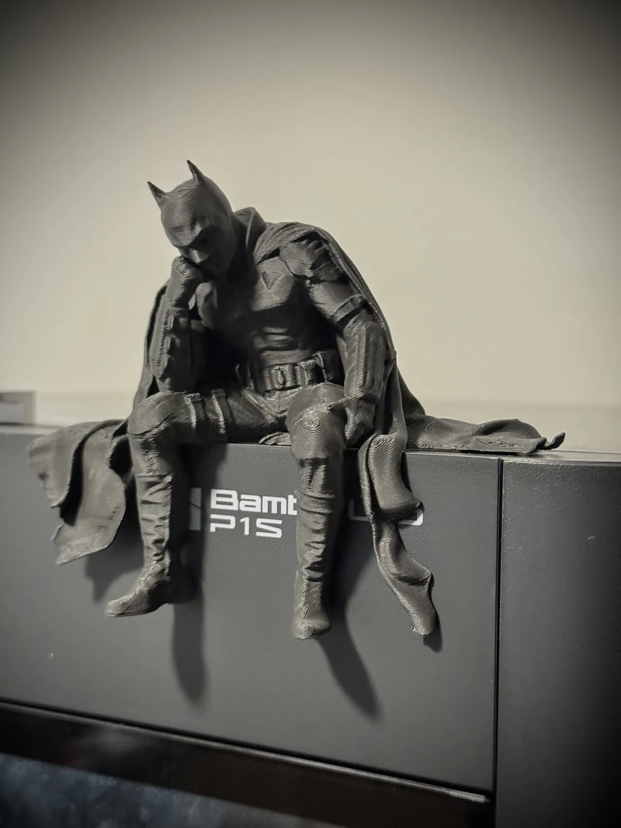 Sad Batman sitting on a Ledge Figurine! view 3