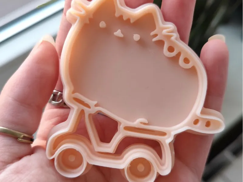 pusheen on a bike - cookie cutter