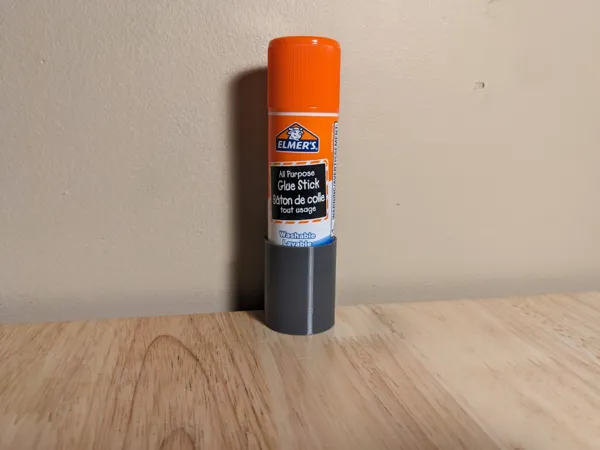 Support de bâton de colle pour panneau perforé