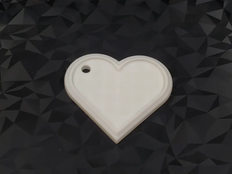 Essence Embrace: Minimalist Heart Pendent